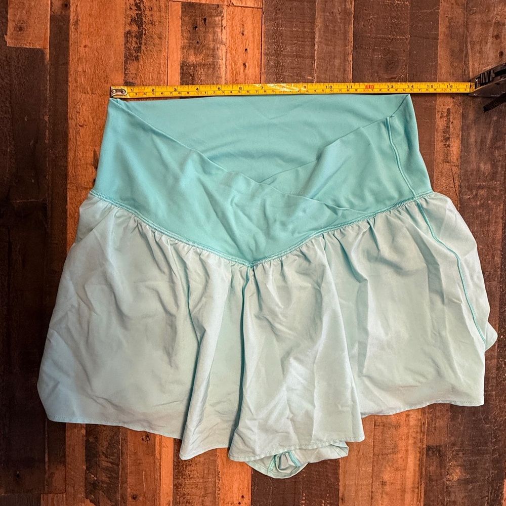 offline by aerie real me crossover flowy short, spandex & pocket inside. Blue